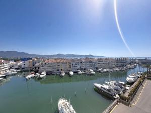 a group of boats are docked in a marina at Apartment Club Nautic-17 by Interhome in Empuriabrava