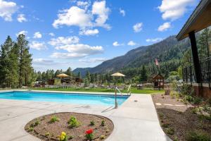 a swimming pool with mountains in the background at Million Dollar View- 419 in Durango