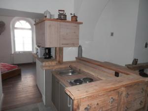 Kuchyň nebo kuchyňský kout v ubytování Apartments in Villa Crusca + 37 fotografií
