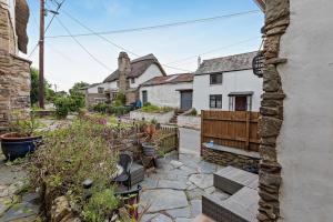 a view of a house with a garden at 2 Bed in Croyde oc-smithc in Croyde