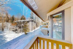 a balcony of a house with snow on the ground at Ideal in Idaho in Ketchum