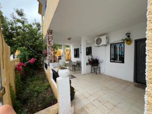 a view of a house with a patio at Dar halouma in Tabarka