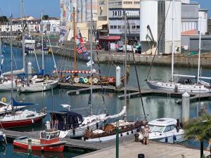 a group of boats are docked in a marina at Ancre Zen in Les Sables-d'Olonne