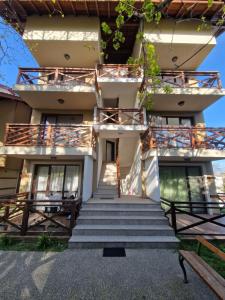a building with stairs in front of it at INFINITY VIEW 8 Lozenets in Lozenets