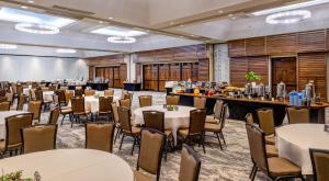 a large banquet hall with tables and chairs at Hilton Phoenix Resort at the Peak in Phoenix