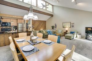 a dining room and living room with a table and chairs at Only 8/22-8/29 Still Available for Summer 2026! in Harbor Springs