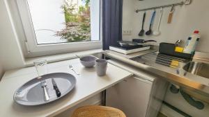 O bucătărie sau chicinetă la Aparthotel B & L +232 fotografii