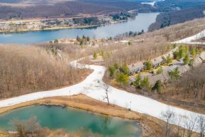 an aerial view of a river with snow at Stella's Retreat in McHenry