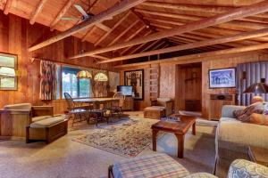 a living room with a table and a dining room at Pee Wee Acres in Swanton