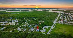an aerial view of a park with a red marker at Dual En-Suite Corner Unit - Sunrise Views in Fort Pierce