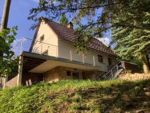a house on the side of a hill at Chata Vedle Jedle in Dolní Morava