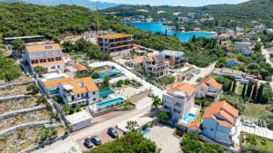 an aerial view of a town with a river and buildings at Rezidence Castello in Korčula