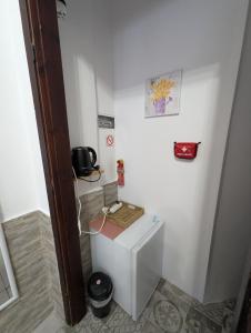 a small bathroom with a toilet in a room at Angel Room 2 in Nea Plagia +27 photos