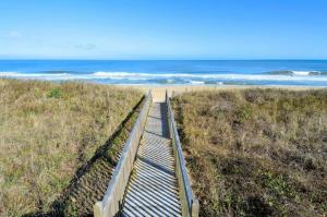 a wooden boardwalk leading to the beach at SW6 - Seawalk 6 in Kill Devil Hills