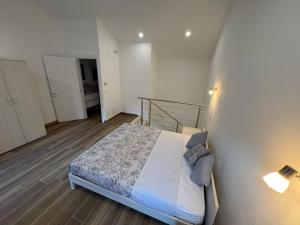 a small bedroom with a bed in a room at Casa Gina in Chioggia +25 photos