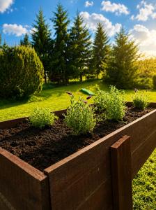 a raised garden with plants in a wooden box at Forest House near Klínovec with 5 Independent Apartments in Kovářská +68 photos
