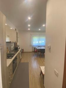 a kitchen with a sink and a stove top oven at Lo chalet sul lago in Ispra