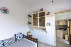 a room with a bed and a kitchen at SOFIA'S HOUSE No 2 in LESVOS in Apidias Lakos +16 photos