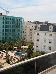 a view of a resort with a pool and buildings at Golem Escape in Kavajë