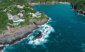 an aerial view of an island in the ocean at Casa Papelillo on Costa Careyes in Chamela