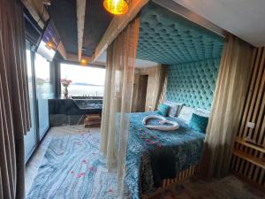 a bedroom with a canopy bed in a room at Refúgio Muas Nature in Vila Real +147 photos
