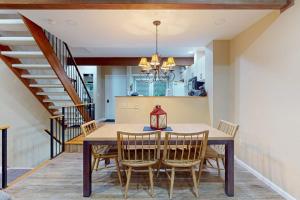 a dining room with a table and chairs at Liftside Retreat in McHenry