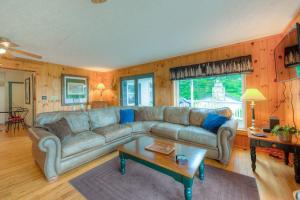 a living room with a couch and a coffee table at Amazing Grace in McHenry