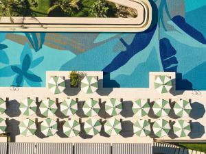 a mural on the side of a building at Hyde Bodrum - Ultra All Inclusive, Adult Only in Torba