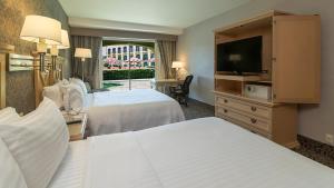 Säng eller sängar i ett rum på Holiday Inn Queretaro Centro Historico, an IHG Hotel