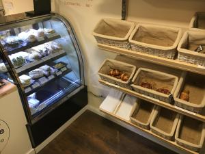 an open refrigerator filled with lots of food at Smart Apartment 2 in Budapest