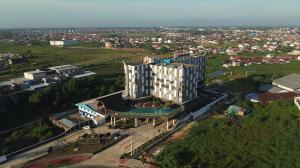 an overhead view of a building in a city at Four Points by Sheraton Pontianak in Pontianak