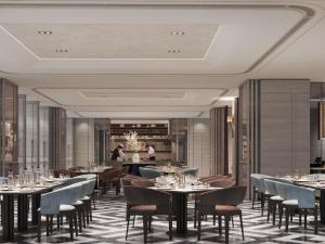 a rendering of a restaurant with tables and chairs at Mövenpick by Accor Shanghai People's Square in Shanghai