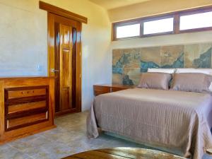 Hotel Casa Maya Calakmul客房内的一张或多张床位