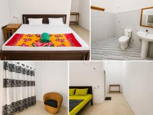 a hotel room with a bed and a bathroom at Stay at arugambay in Pottuvil