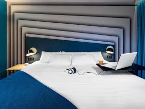 Llit o llits en una habitació de ibis Styles Avignon Sud