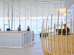 a group of people working in an office at Novotel Thalassa Le Touquet in Le Touquet-Paris-Plage +136 photos
