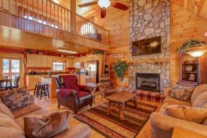 a living room with a couch and a fireplace at New River Ramble in Todd