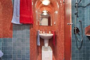 a bathroom with a sink and a mirror at The Sirens House in Nerano +39 photos