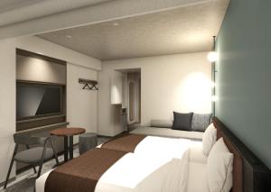 a hotel room with a bed and a desk at Nest hotel alt Sapporo Odori in Sapporo