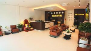 a lobby with chairs and a waiting area in a hospital at ARIA Hotel in Ninh Binh