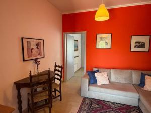 a living room with a couch and a table at Art & Motion Union - Guest Room 3 in Apoíkia