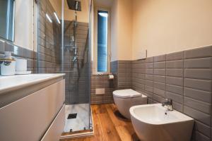 a bathroom with a sink and a toilet at Corso52 B&B in Monte Libretti