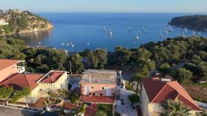 an aerial view of a bay with boats in the water at Diogenis Parga Studios in Parga