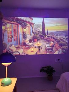 a room with a painting of a patio at 스테이149 in Hyomoktong-Ilgu