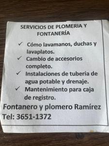a piece of paper with a list of names on it at Mio y tuyo in Flores