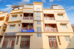 a building with a sign that reads hotels at Fabhotel Grant Heights - Nr Biju Patnaik International Airport in Bhubaneshwar