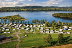 an aerial view of a campground next to a lake at Odin Camping AS in Svensrud