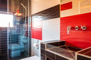 a bathroom with a sink and a toilet and a shower at Baelo Claudia in Navalguijo +19 photos