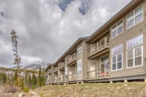 a building with balconies on the side of it at Wildernest Gore Trail Condo in Silverthorne