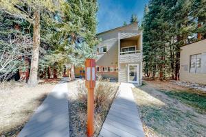 a house with an orange parking meter in front of it at Mountain Breeze in Breckenridge